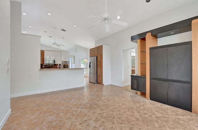 unfurnished living room featuring vaulted ceiling, ceiling fan, and light tile patterned flooring