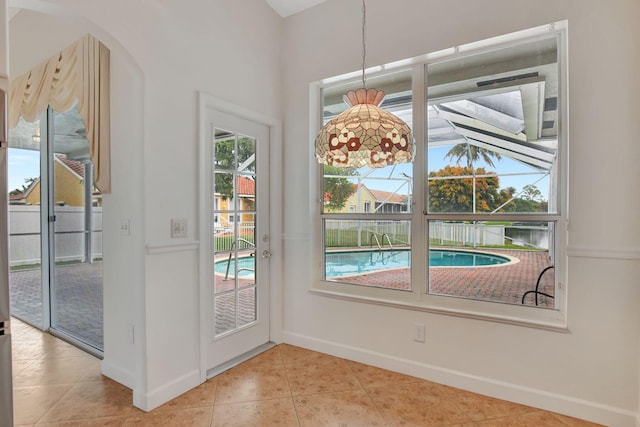 entryway with light tile patterned floors