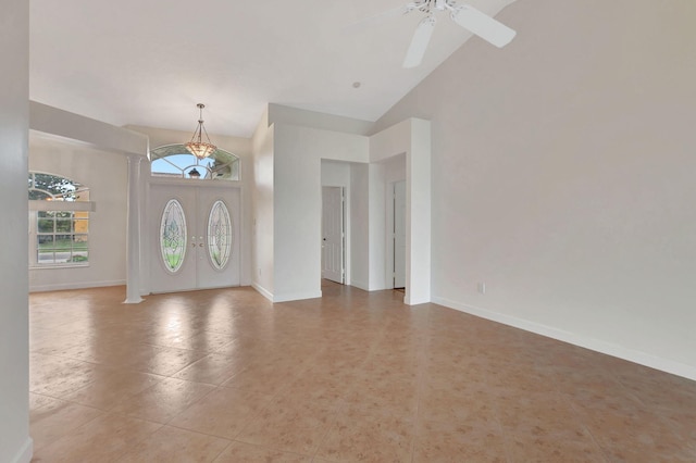 foyer featuring high vaulted ceiling and ceiling fan