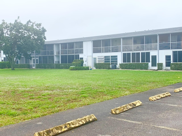 view of building exterior with central AC