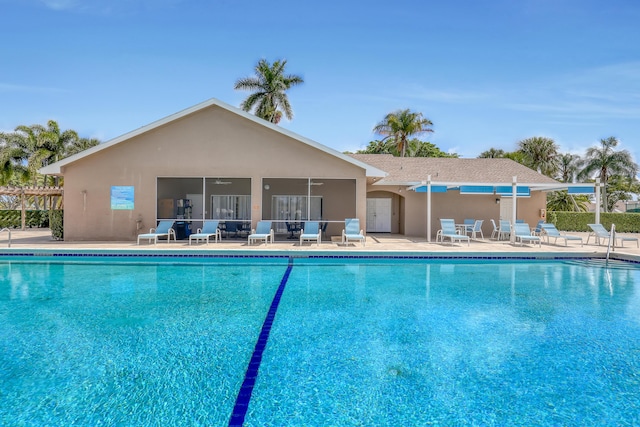 view of swimming pool featuring a patio