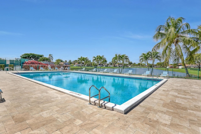 view of swimming pool with a patio area