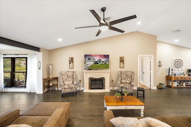 living room featuring lofted ceiling, ceiling fan, and dark hardwood / wood-style floors