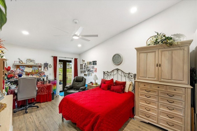 bedroom featuring light hardwood / wood-style flooring, access to outside, french doors, lofted ceiling, and ceiling fan