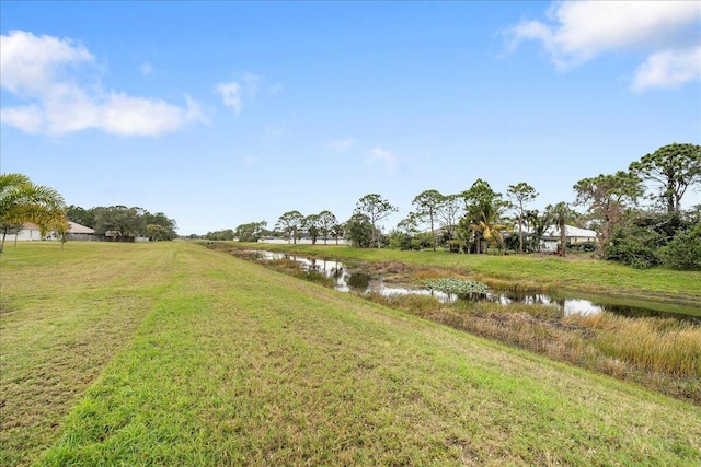 view of yard with a water view