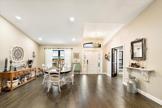 dining area with dark hardwood / wood-style flooring