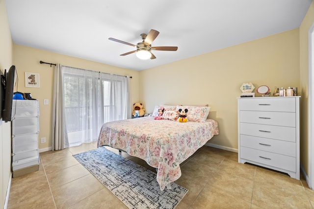 bedroom featuring ceiling fan and light tile patterned floors