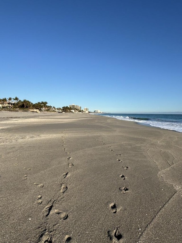 property view of water with a beach view