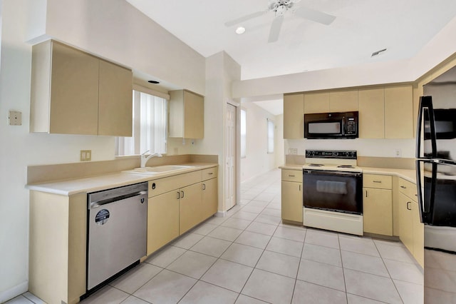 kitchen featuring light tile patterned flooring, ceiling fan, sink, and black appliances