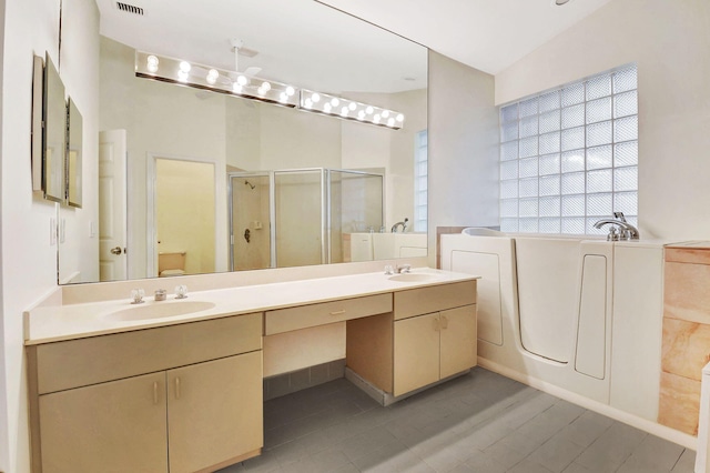 bathroom with vanity, separate shower and tub, and hardwood / wood-style floors