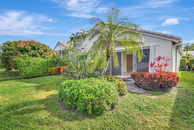 exterior space featuring a lawn