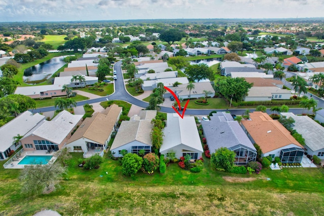 drone / aerial view with a water view