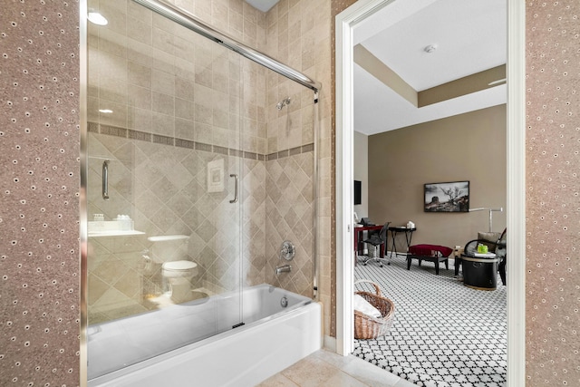 bathroom featuring tile patterned floors and enclosed tub / shower combo