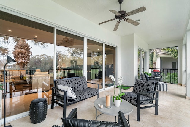 view of patio featuring ceiling fan