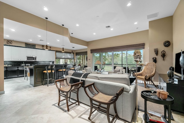 interior space with visible vents and recessed lighting