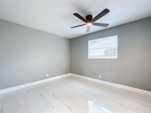 spare room featuring ceiling fan