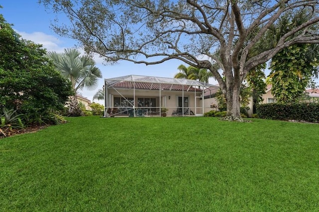 view of yard with a lanai