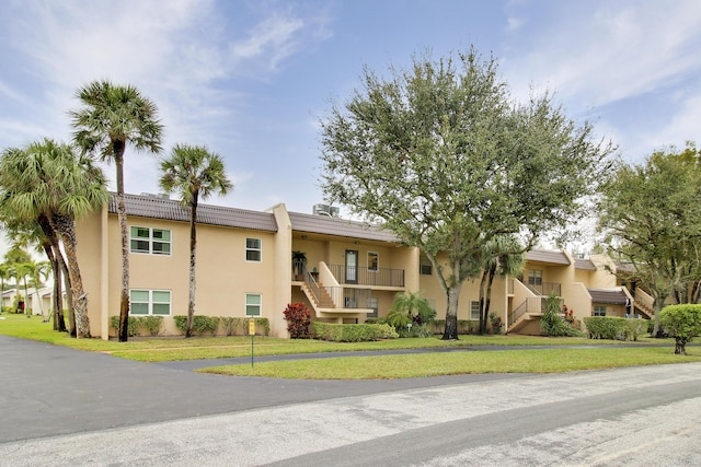 exterior space with a front lawn