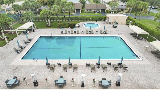 view of swimming pool featuring a patio