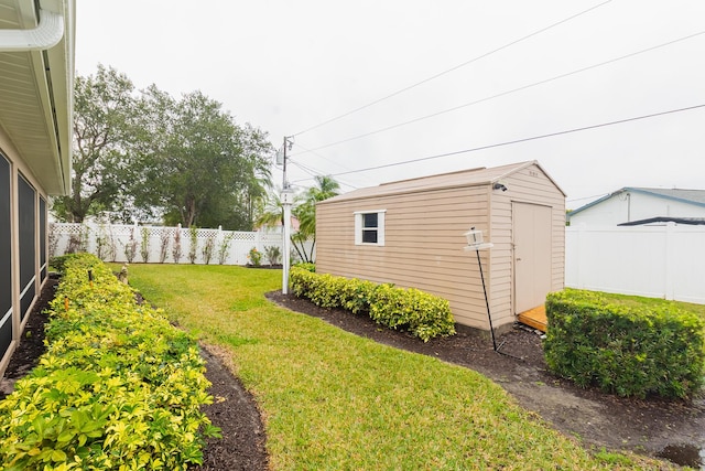 view of yard with a storage shed