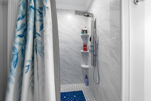 bathroom featuring crown molding and curtained shower