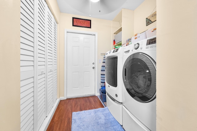 laundry room featuring separate washer and dryer and dark wood-type flooring