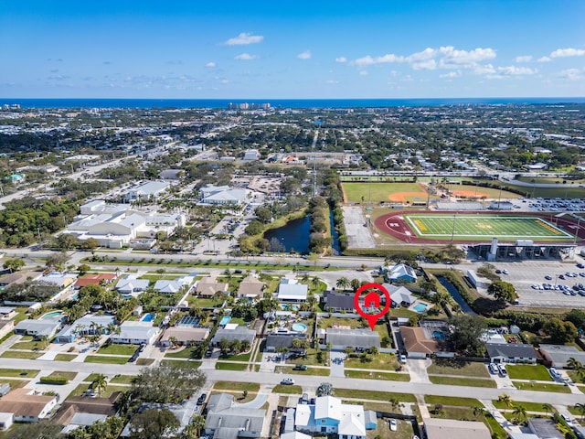 bird's eye view with a water view