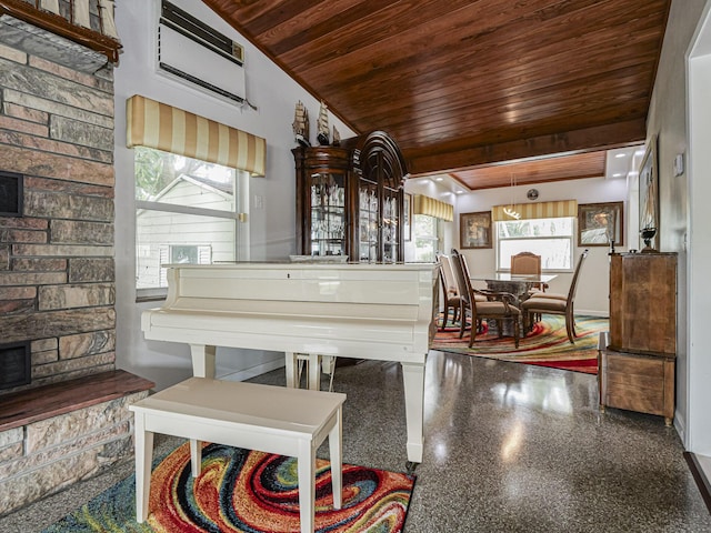 living area featuring a wall mounted air conditioner and wood ceiling