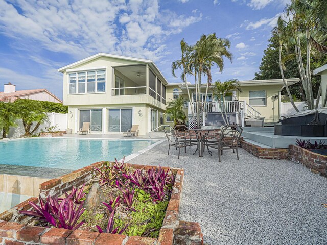 view of pool featuring a water view