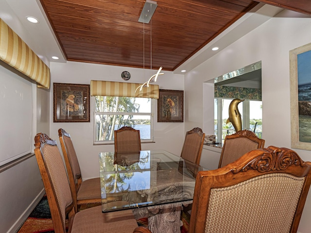 dining space featuring plenty of natural light, wooden ceiling, a raised ceiling, and recessed lighting