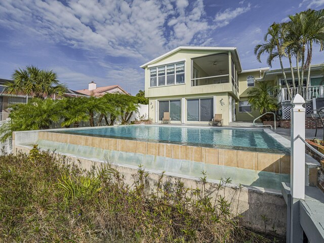 view of front of home with a water view and a front yard