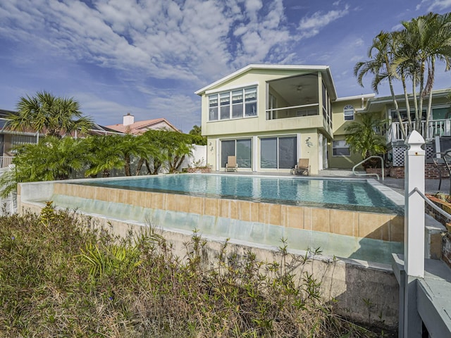 outdoor pool featuring a patio area