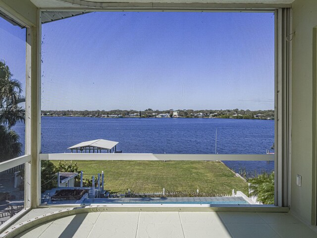 balcony featuring a water view