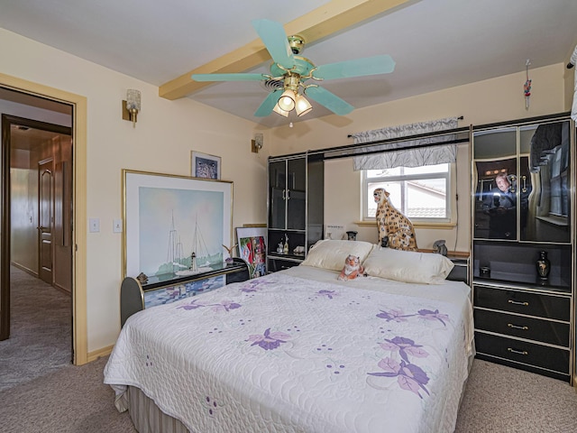 bedroom featuring carpet, baseboards, and a ceiling fan