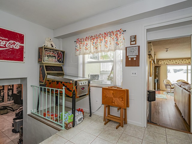 interior space featuring light tile patterned floors