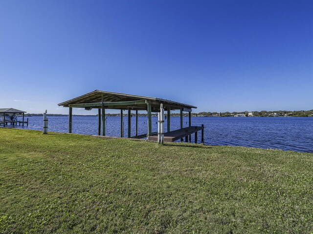 dock area featuring a water view