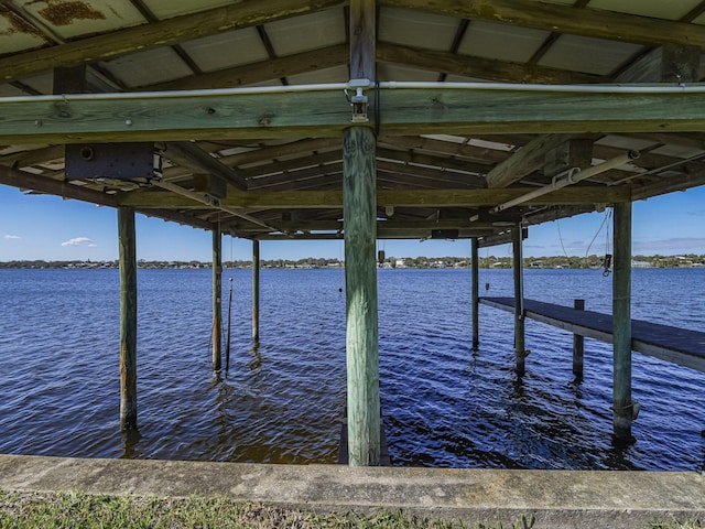 view of dock with a water view and boat lift