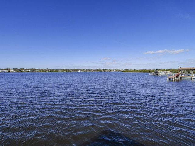 view of water feature with a boat dock and boat lift