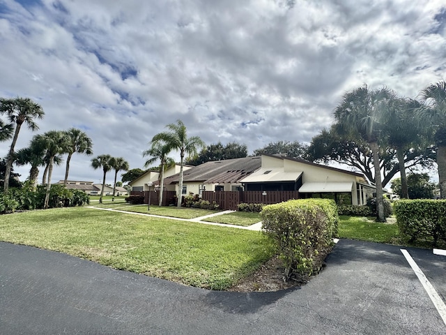 exterior space featuring a front yard