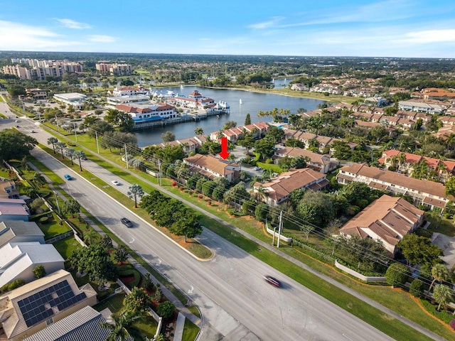 drone / aerial view with a water view