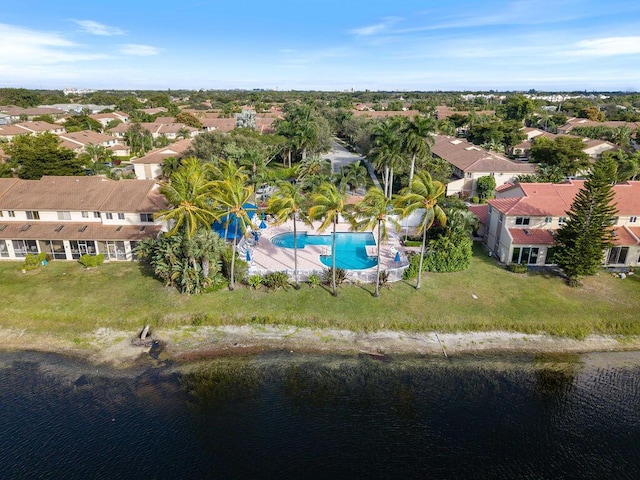 aerial view with a water view and a residential view