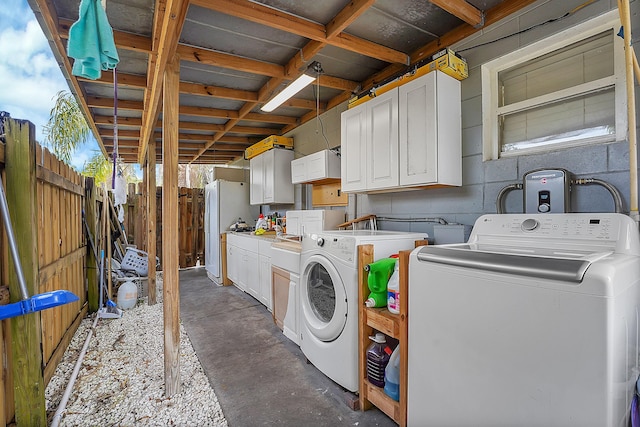 laundry room featuring independent washer and dryer