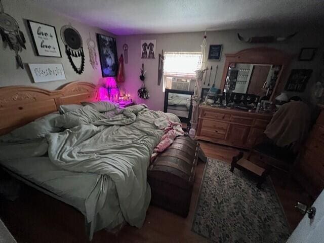 bedroom featuring a textured ceiling