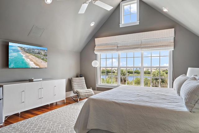 bedroom with ceiling fan and dark wood-type flooring