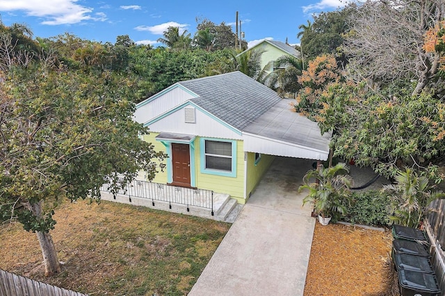 view of front of property with a carport