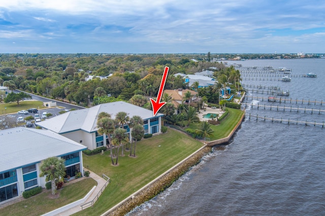 birds eye view of property featuring a water view