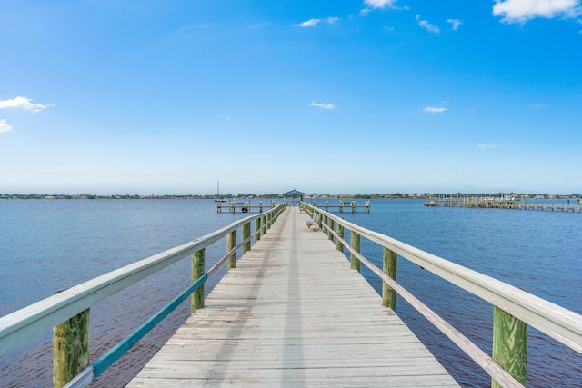 view of dock with a water view