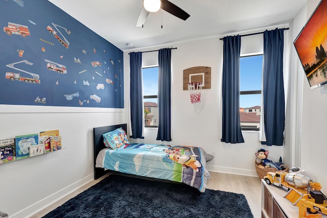 bedroom featuring ceiling fan and light wood-type flooring