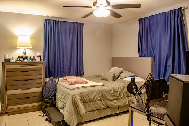 bedroom featuring ceiling fan and light tile patterned floors