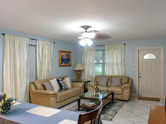 living room with ceiling fan